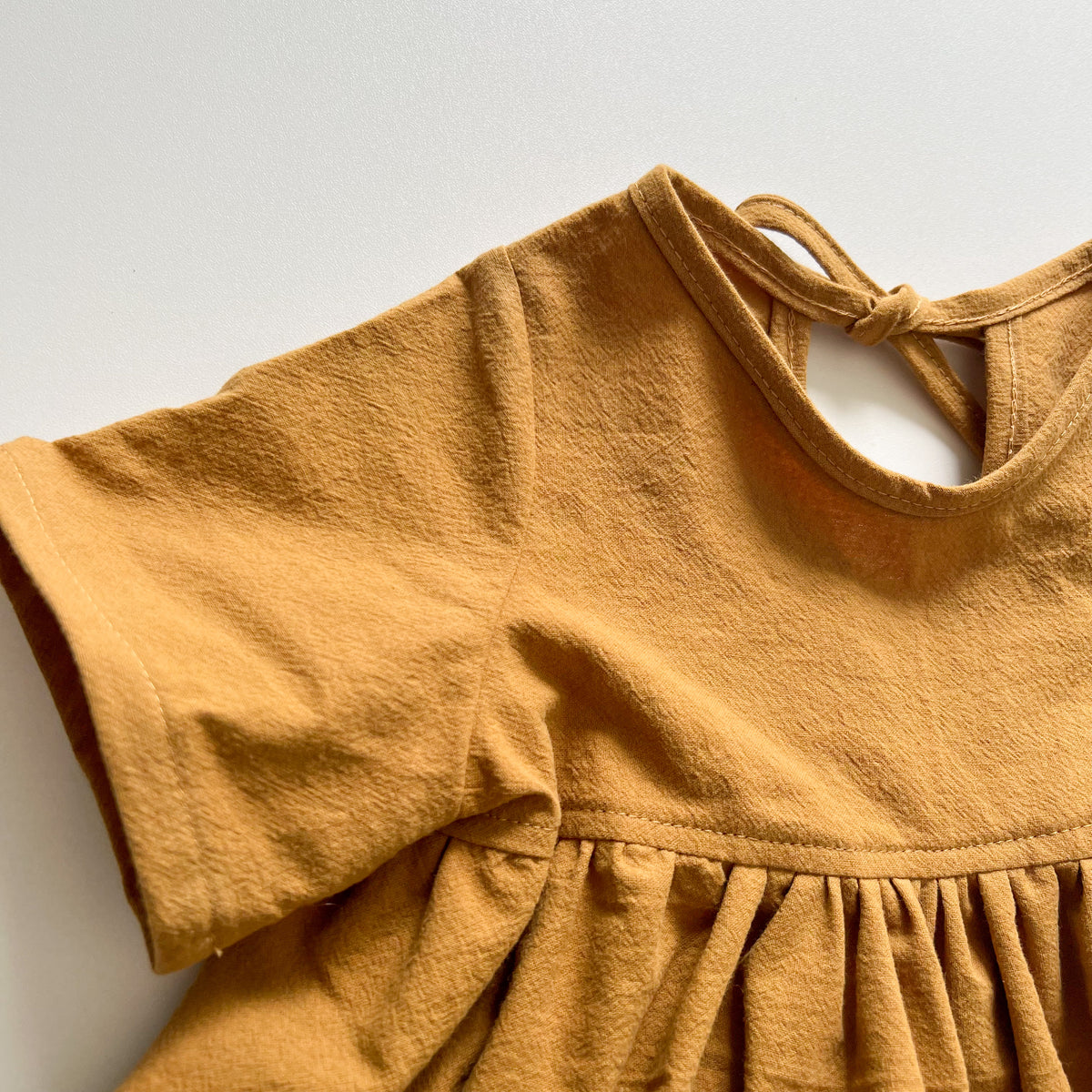 Nora Short-Sleeved Tunic with  Pockets in 'Saffron Crepe' - Ready To Ship